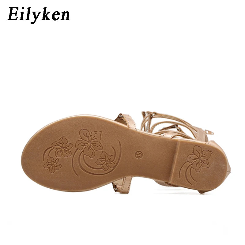Eilyken 2026 New Golden Gladiator Roman Women Boots Sandals PU Leather Open Toe Knee High Rivet Leisure Flat Shoes